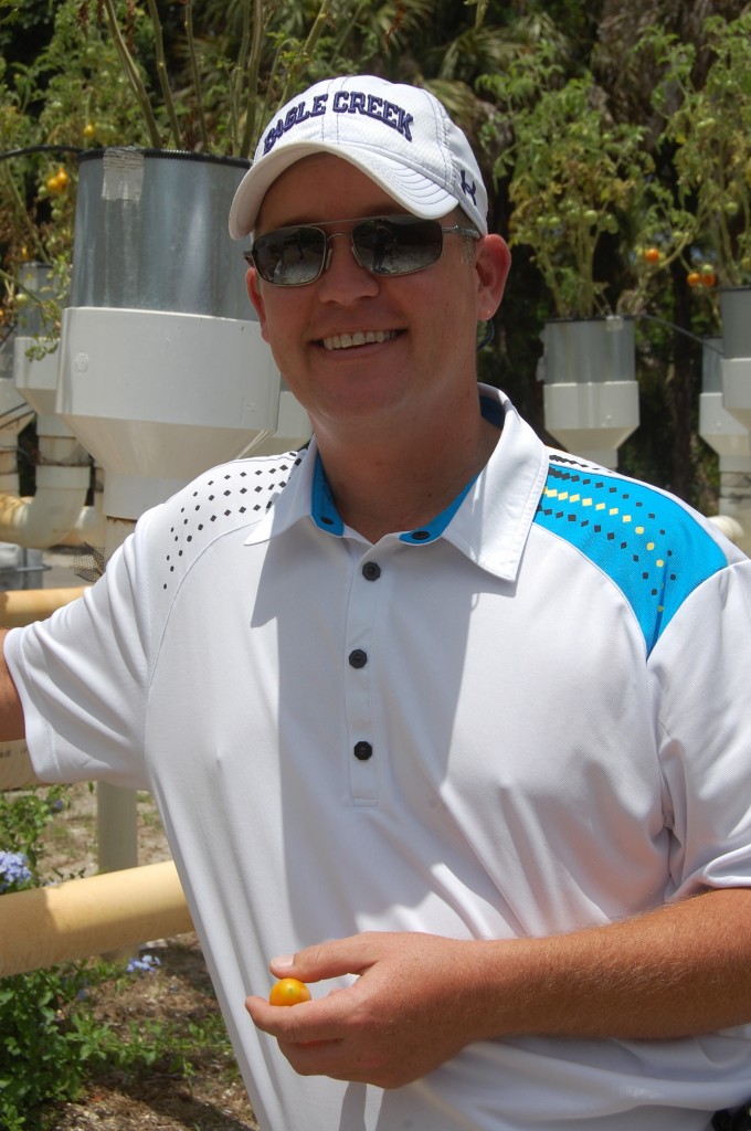 Golf Course Superintendent Jimmy Alston built a modified hydroponic garden at Eagle Creek Golf and Country Club, growing organic vegetables and fruit. 